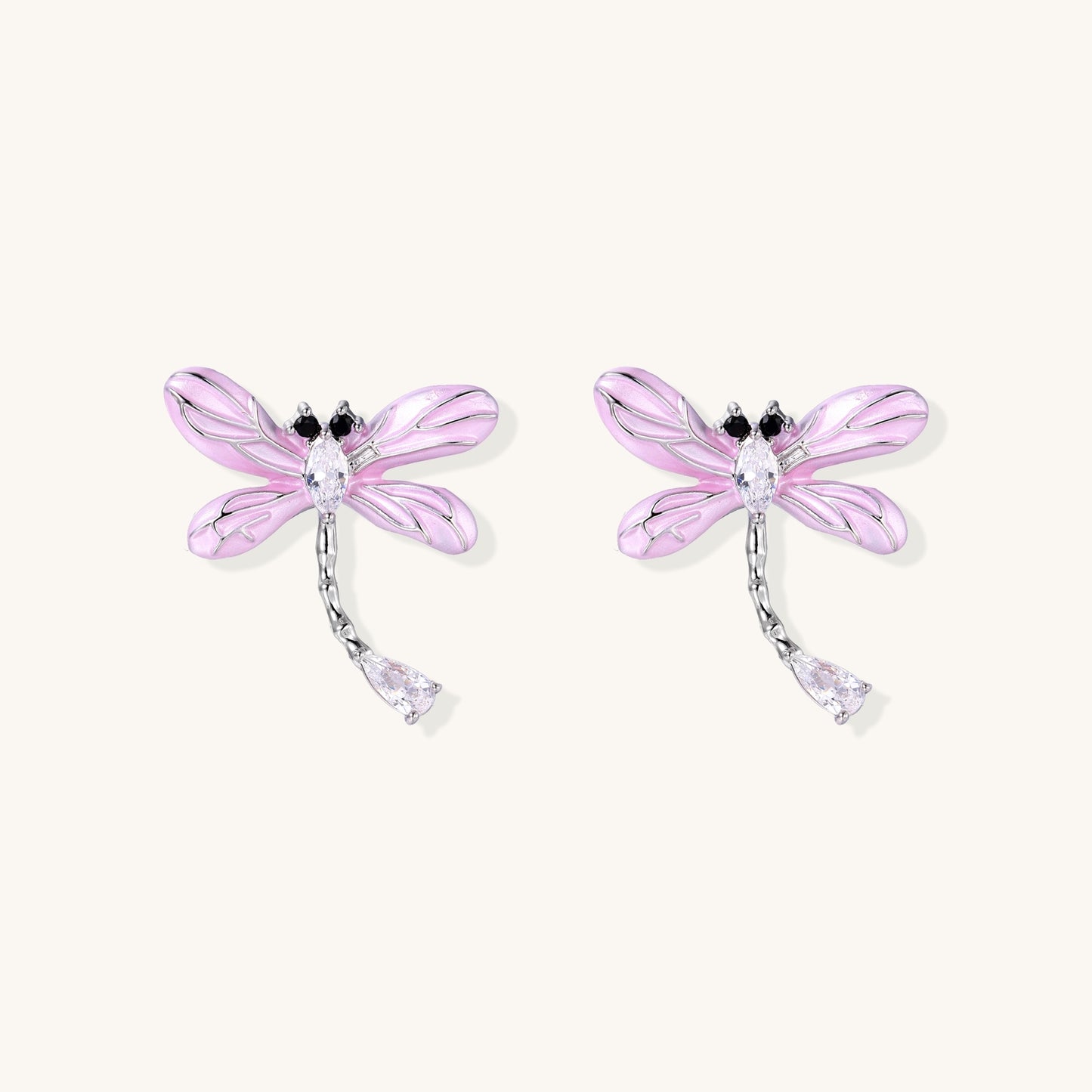 Long dangle earrings with purple dragonfly charms and crystal chains on white background, gold-plated finish.