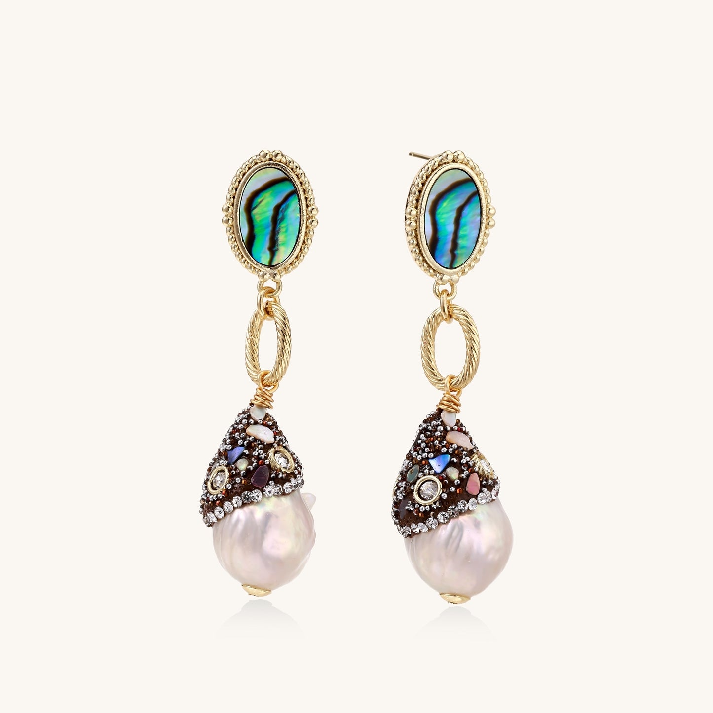 Gold-plated statement earrings with iridescent abalone shells, rope chain links, and crystal-capped baroque pearls