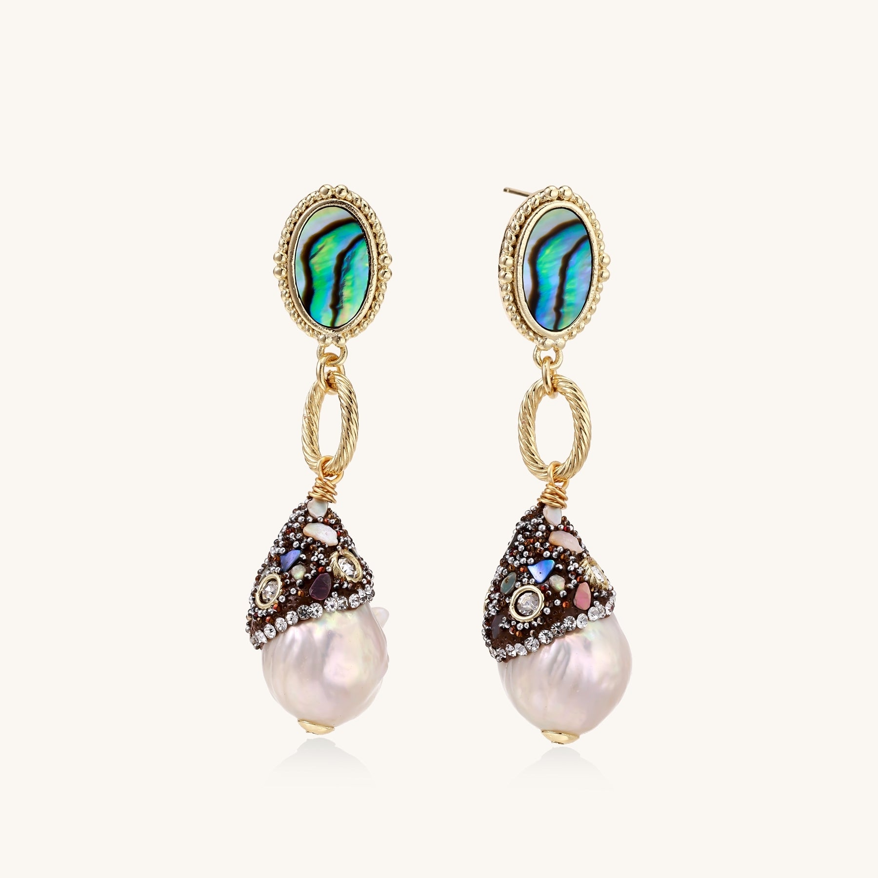 Gold-plated statement earrings with iridescent abalone shells, rope chain links, and crystal-capped baroque pearls