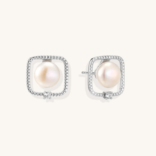 Square sterling silver stud earrings with freshwater pearls and crystal accents on white background.
