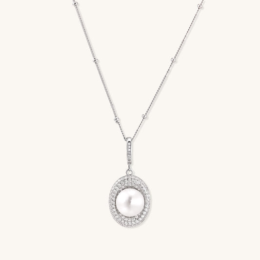 Sterling silver necklace with freshwater pearl in sparkling crystal halo pendant on delicate beaded chain