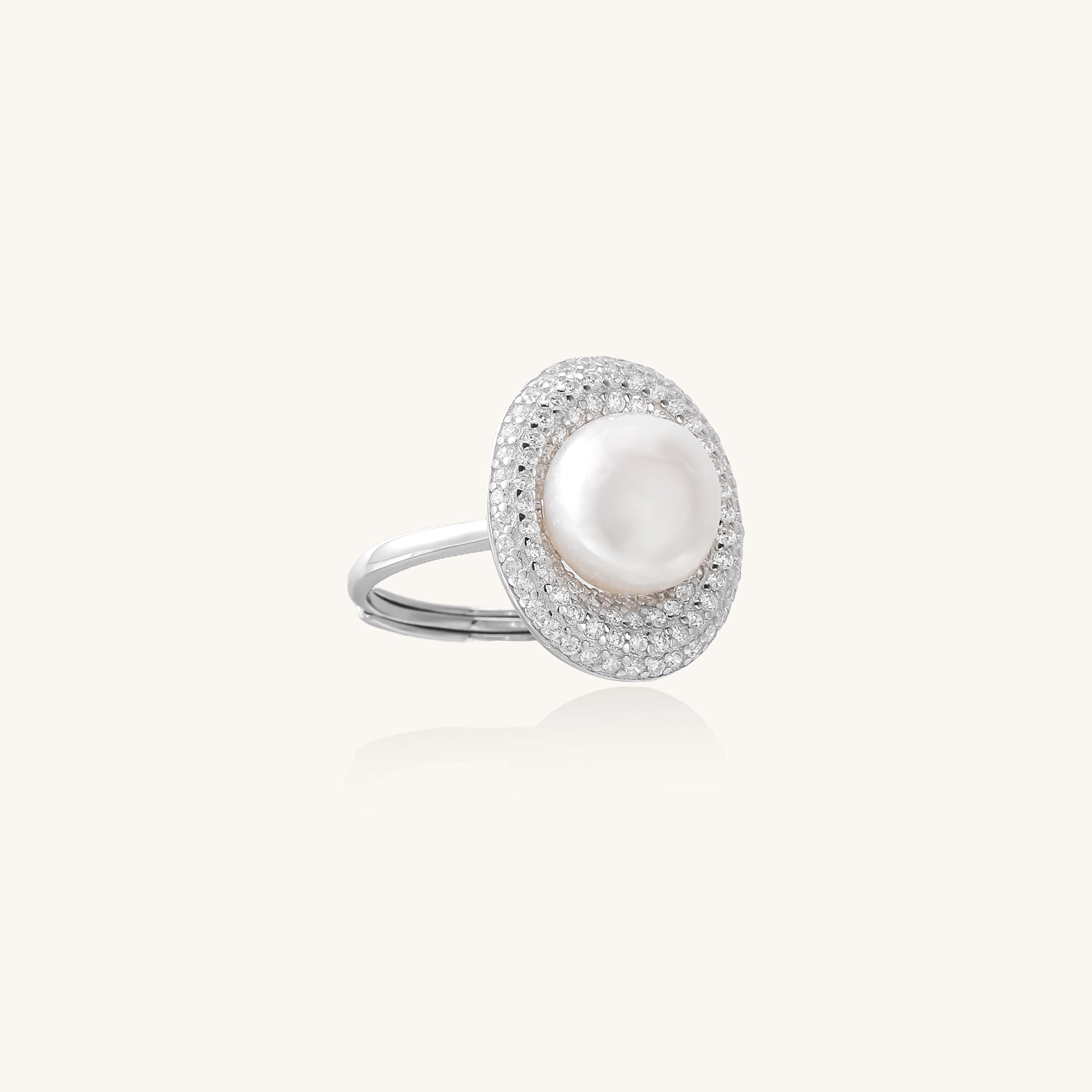 Sterling silver ring with 9mm freshwater pearl center surrounded by double halo of sparkling crystals