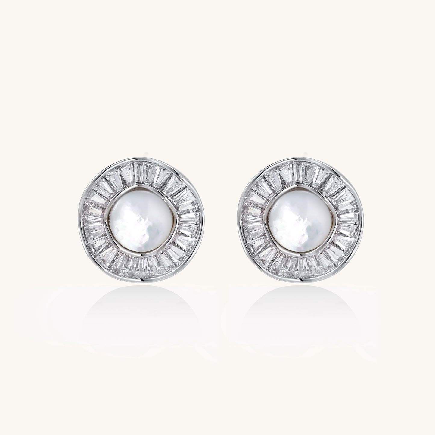 Gold-plated stud earrings with central freshwater pearl surrounded by baguette crystals in radial pattern