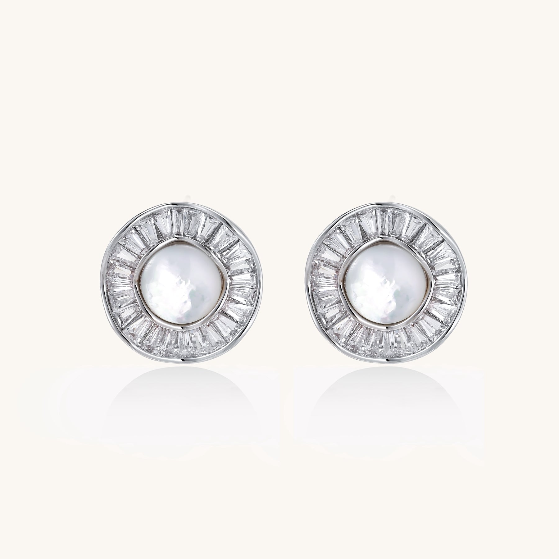 Gold-plated stud earrings with central freshwater pearl surrounded by baguette crystals in radial pattern