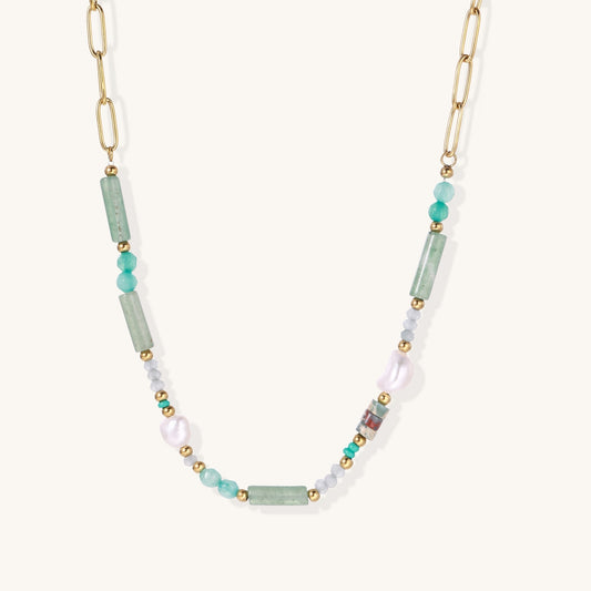 Gold-plated chain necklace with green prasem quartz, freshwater pearls, and mixed beads in modern asymmetrical design